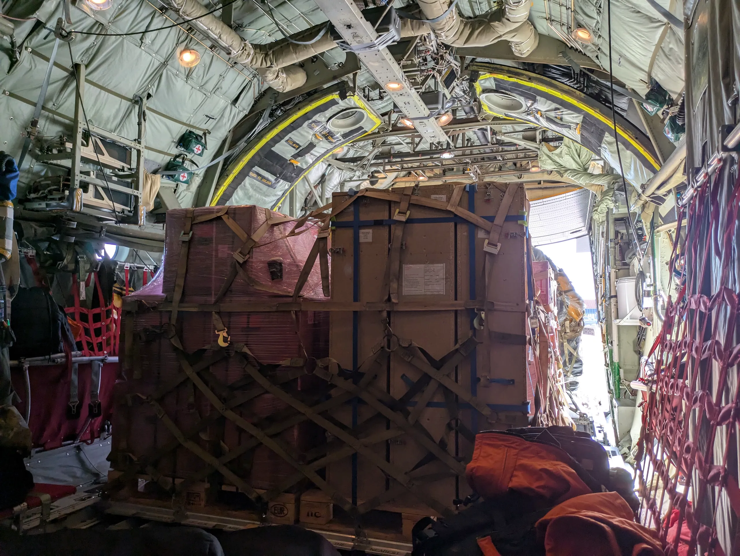 Cargo filling the back of the plane.