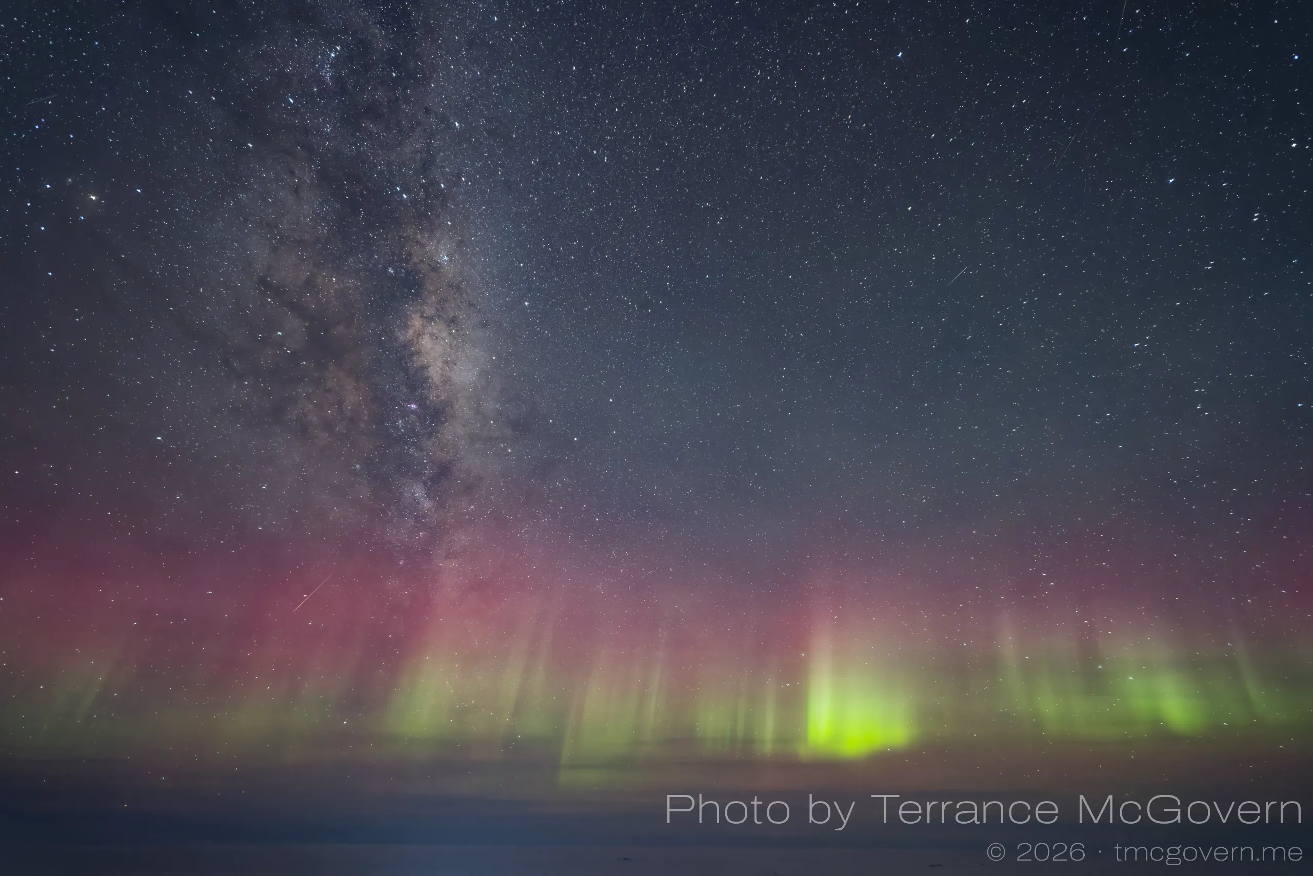 Auroras and the Milky Way over the sea ice