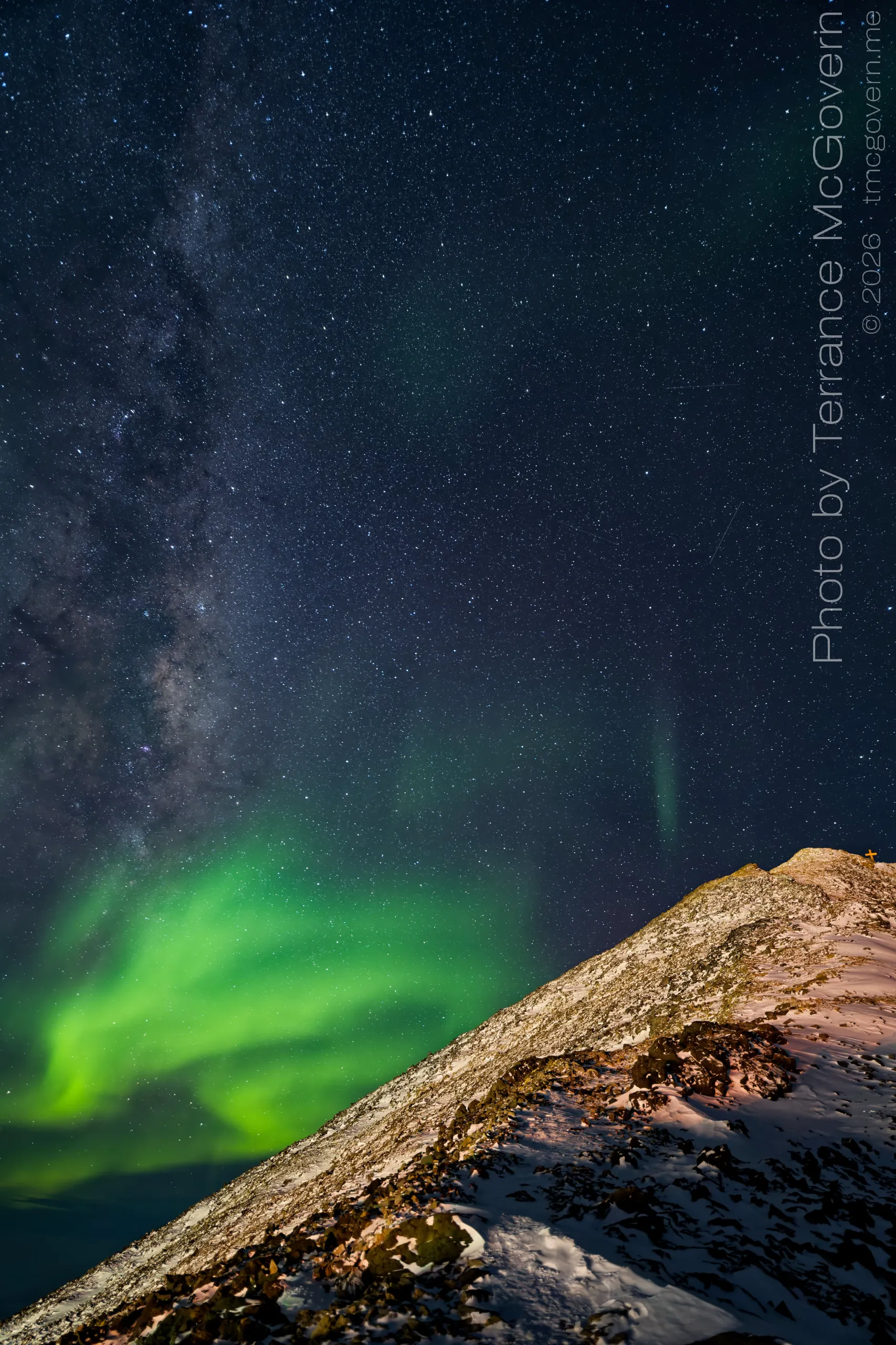 On the trail to the top of Observation Hill with strong auroras